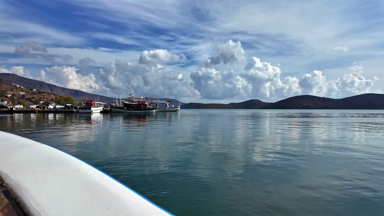 Relaxing view of pier and mountains of Crete island