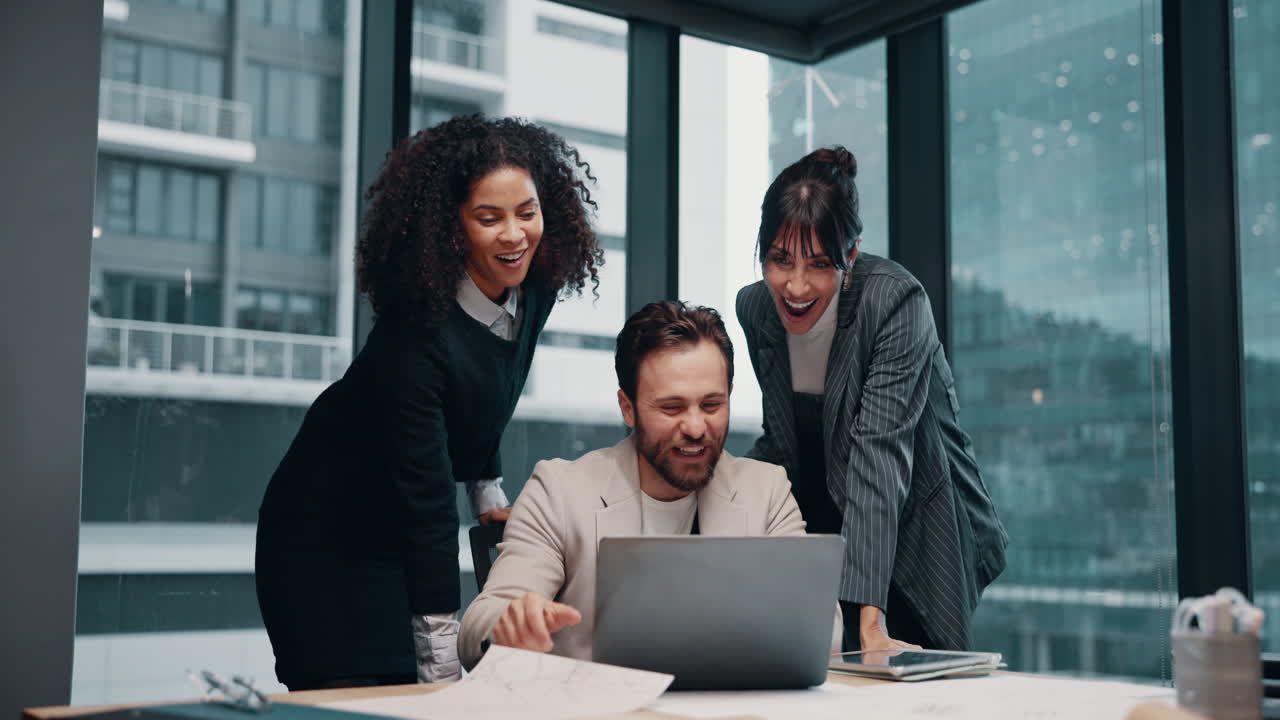 Business Team Celebrating Success in Modern Office