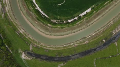 Bird&#039;s eye view of a bend in a river in Sussex, UK