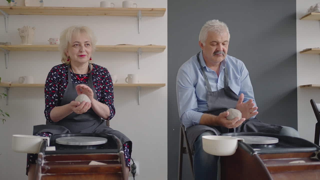A group of senior women and a man together learn to make pottery on a potter's wheel. Making utensils on a retired potter's wheel