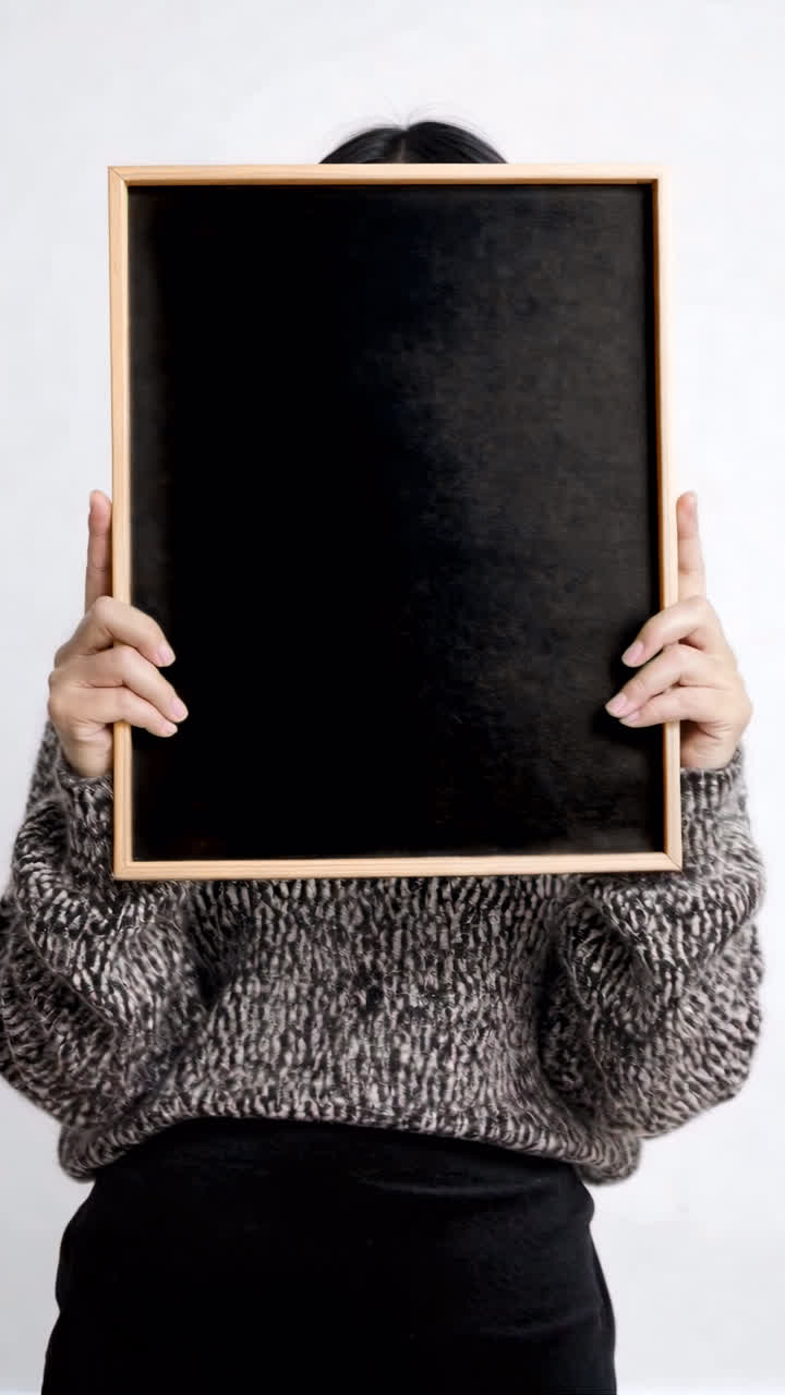 Woman holding picture frame live mockup, animated overlay, transparent 4K video, alpha channel