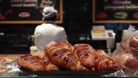 fresh baked croissant on plate with copy space  high quality photo