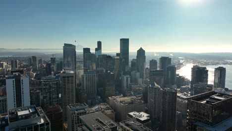 sunlight on seattle high-rise buildings and cityscape on beautiful, blue sky day