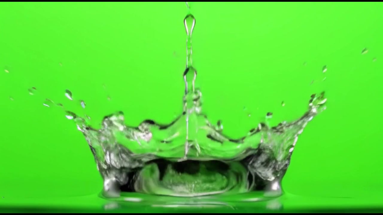 Single Water Drop Falling and Creating a Splash on Green Screen