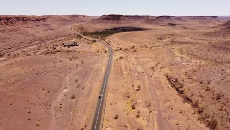 Adventure-Across-Endless-Dunes:-4K-drone-shot-of-Desert-Drive-in-Namibia,-Africa-with-Rooftop-Tented-4x4-Toyota-Hilux