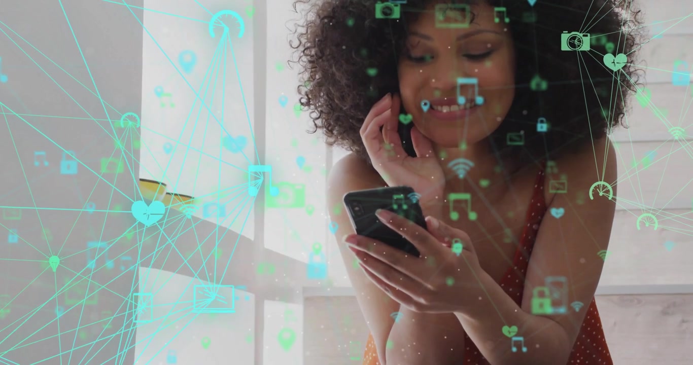Animation of network of connections with icons over african american woman using smartphone