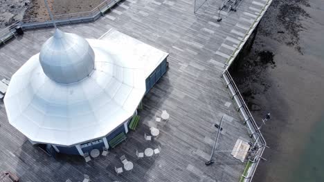 bangor garth pier victorian ornamental silver dome pavilion landmark tourist aerial view top down pull away