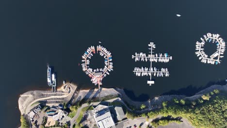 aerial view of a marina with numerous boats docked