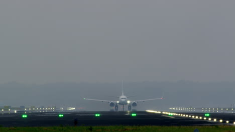 airplane landing in foggy conditions