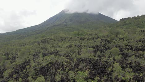 flyover rugged old lave field terrain toward arenal volcano, costa rica