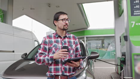 man at a gas station