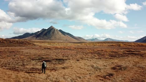 solo hike walking in northern yukon tundra