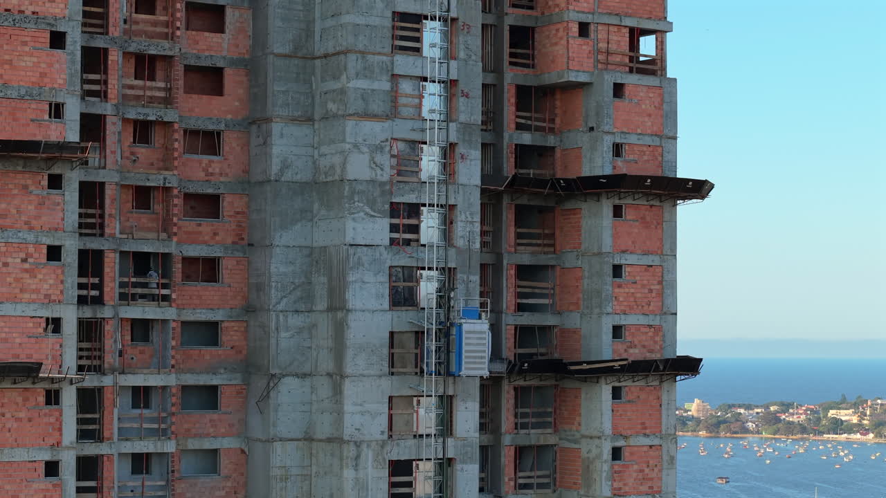Construction elevator on a tall building in Penha, Santa Catarina, Brazil