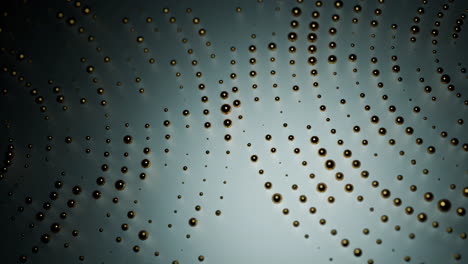 abstract golden droplets pattern on dark background