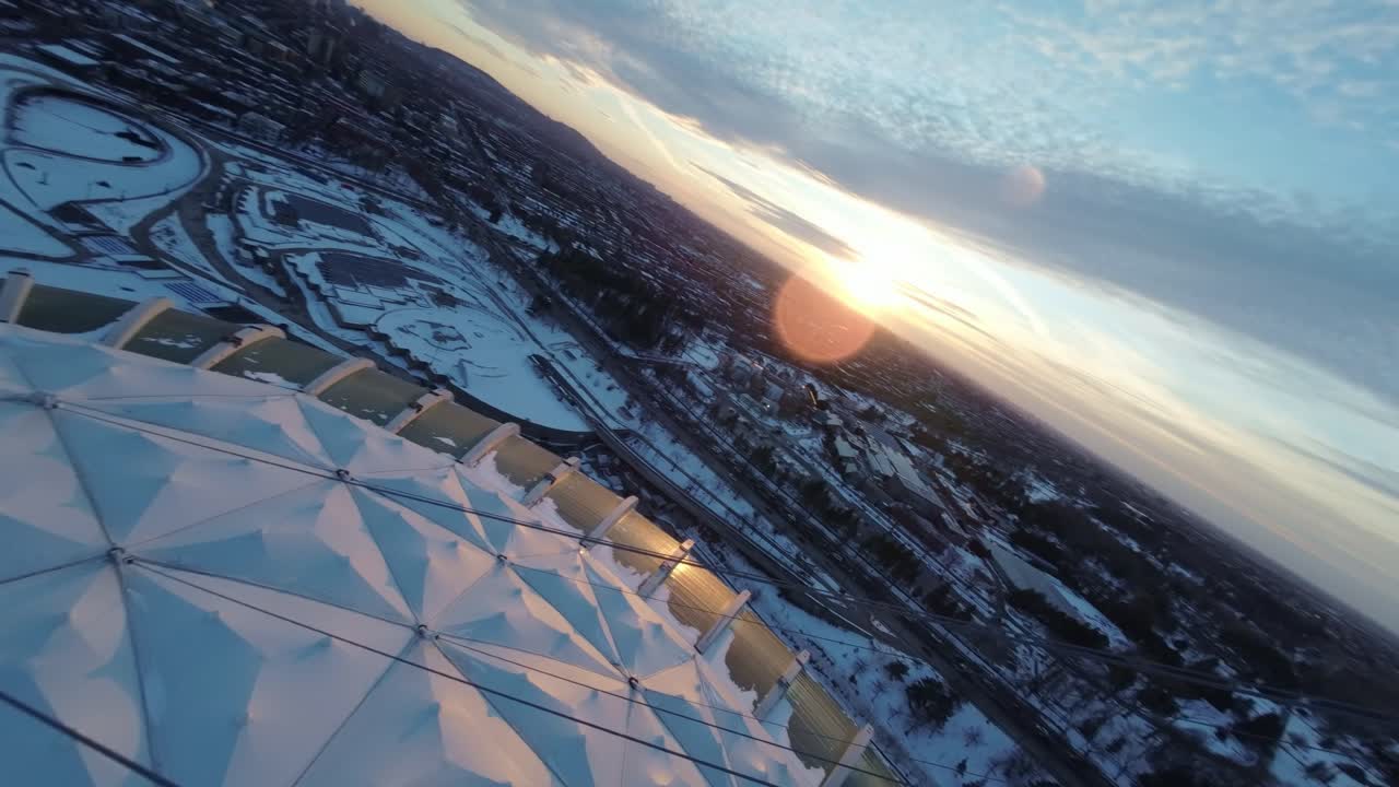 Aerial View of Montreal Olympic Stadium in Winter at Sunset