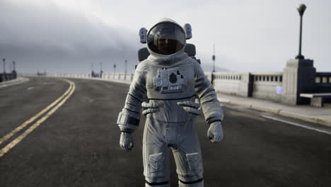 astronaut in space suit on the road bridge