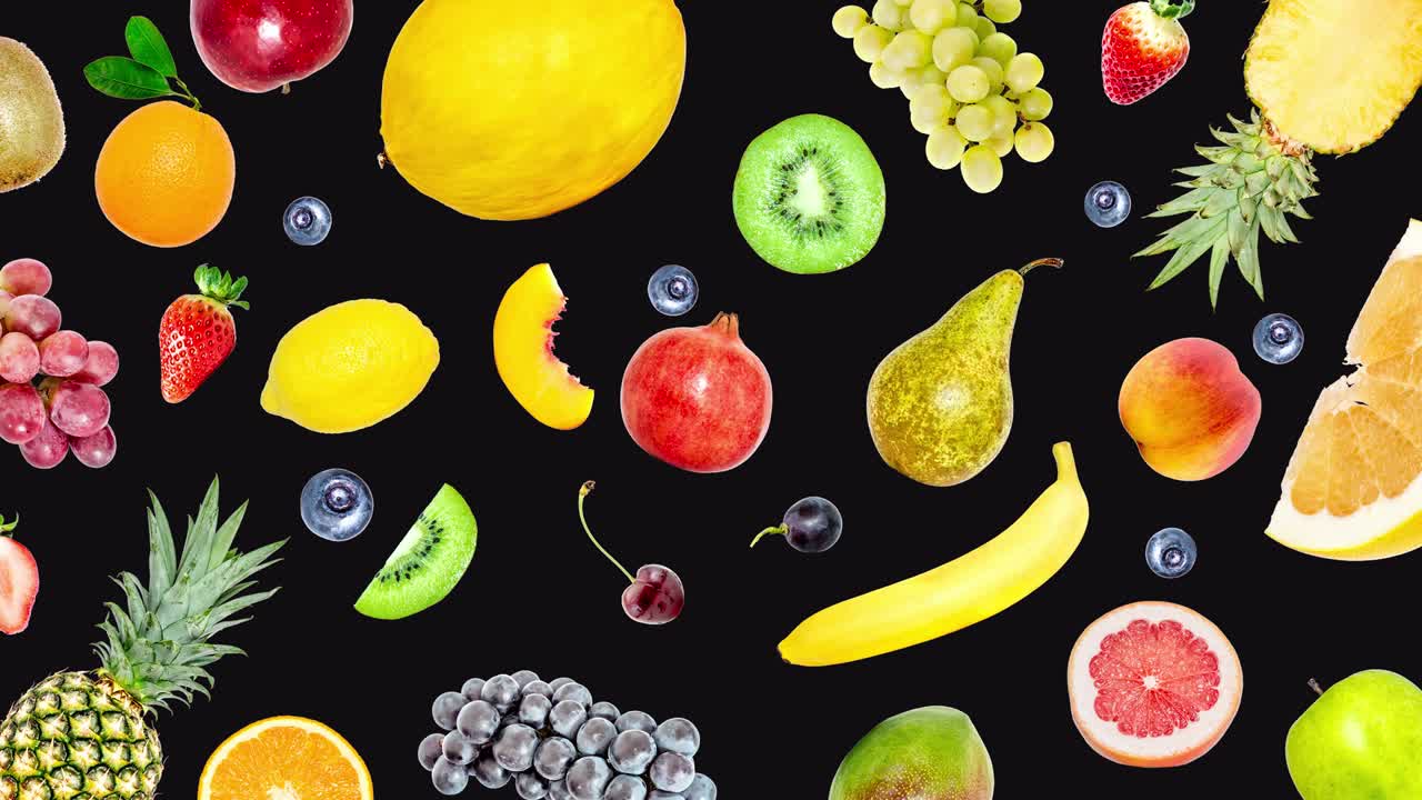 Creative 4k stop motion video animation of many different exotic tropical bright fruits that quickly appear on a black background and disappear. View from above. Seamless loop.
