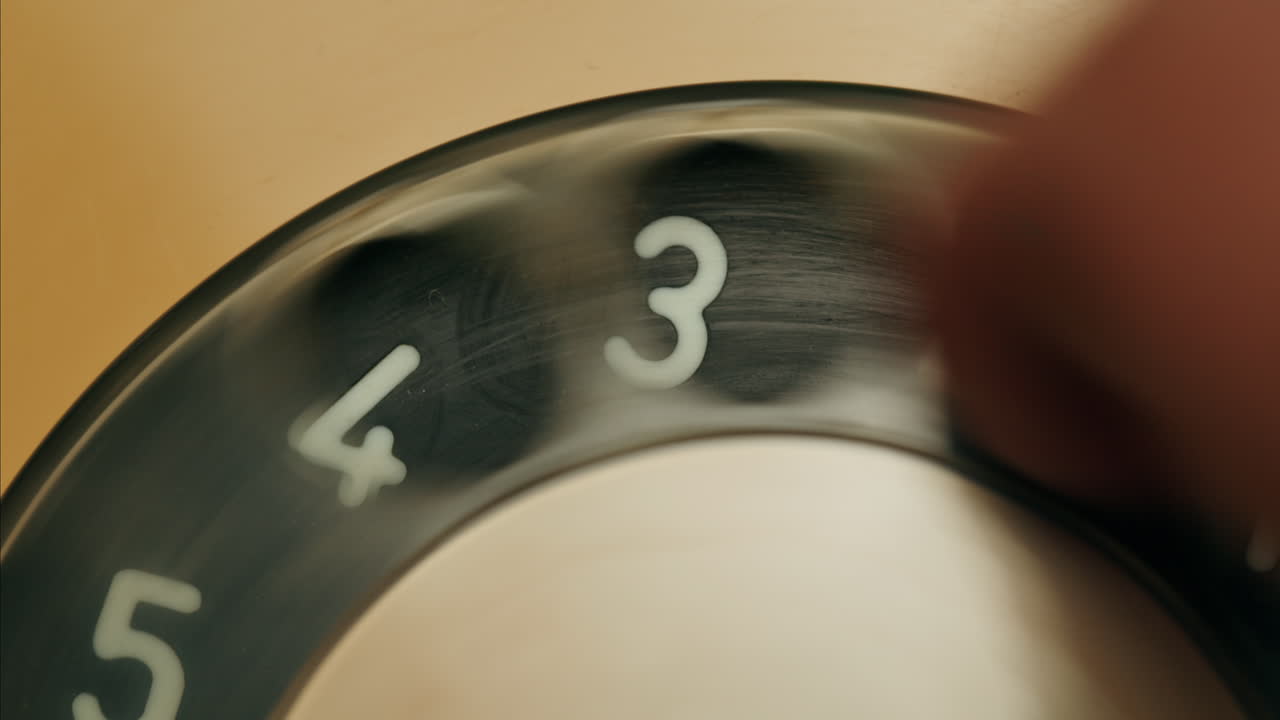 Retro vintage phone, A yellow rotary telephone is displayed on a wooden desk, adding a nostalgic touch