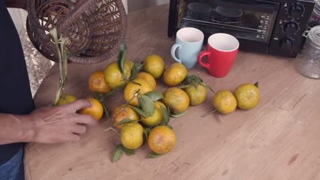 Men who choose oranges on the table