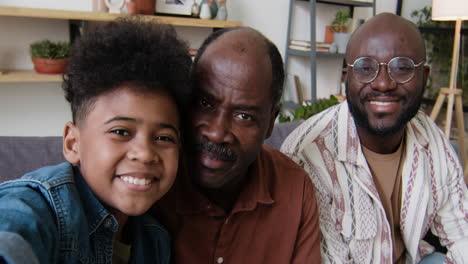 Selfie-of-black-men-and-boy-in-the-living-room