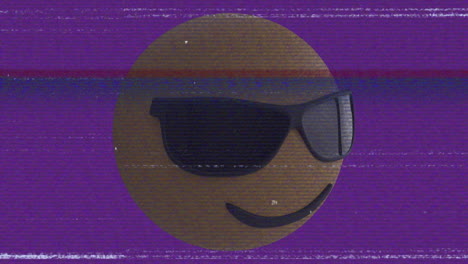 animación del icono emoji de las gafas de sol sobre la pantalla con ruido