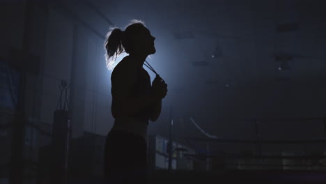 Slow-motion-girl-boxer-jumping-rope-near-the-ring