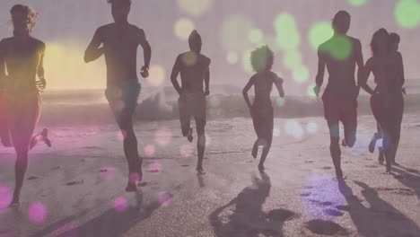 group running on beach, showcasing marketing concept with colored bokeh and lens-flare animations
