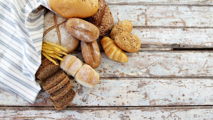 Various types of breads with wheat grains