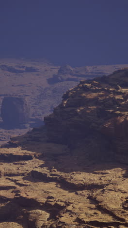 majestic rocky landscape under a clear blue sky in a remote desert area