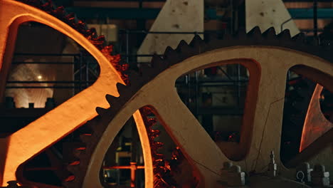 big industrial group of gears working in the machinery