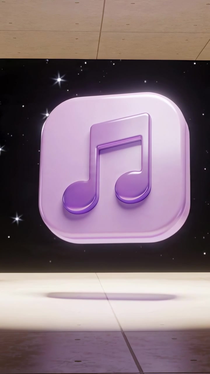 Video verticale: All'avvio, icona viola arrotondata che ondeggia con una nota musicale in rilievo che ruota su un palco stellato.