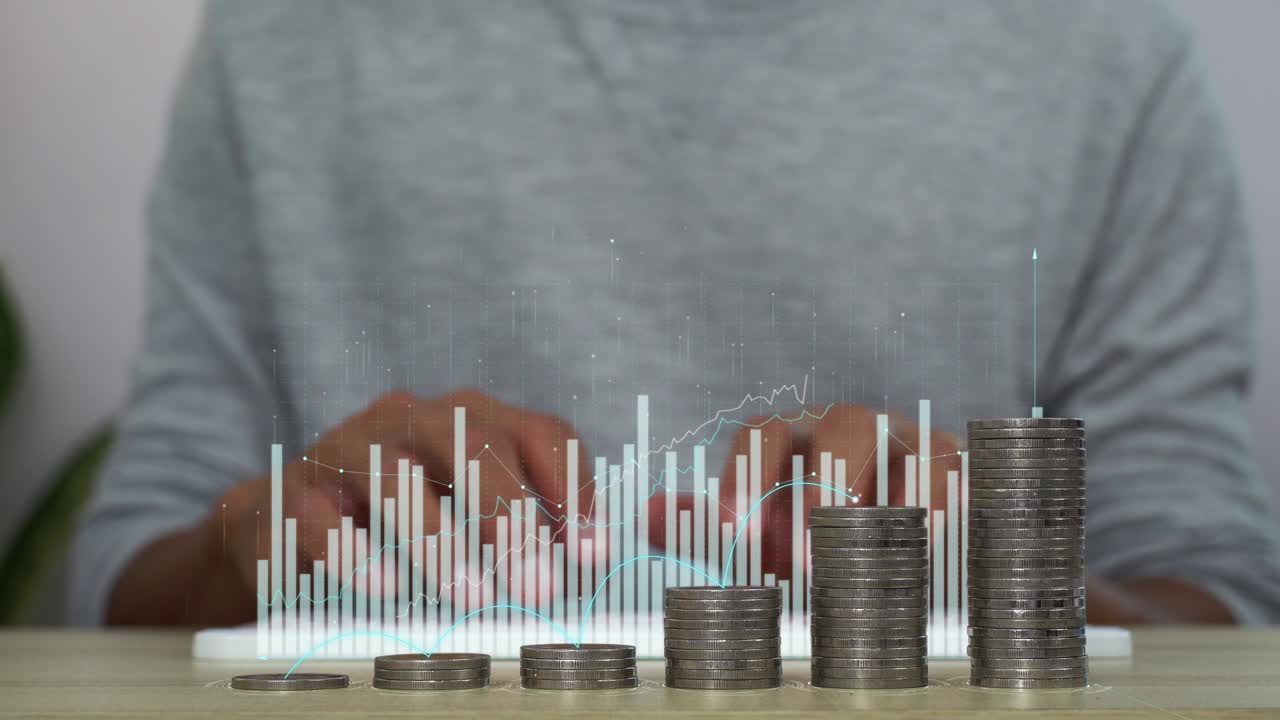 un holograma de datos de análisis de negocios. concepto de crecimiento de negocios. aumento de la pila de monedas.