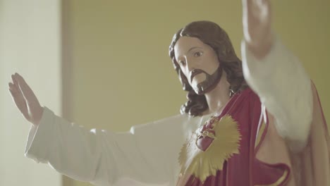wooden jesus statue colorful close