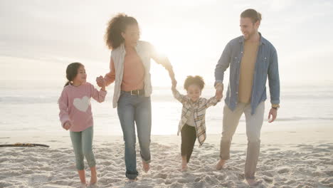 family, holding hands and dad swing girl on beach