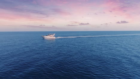 luxury yacht at sunset