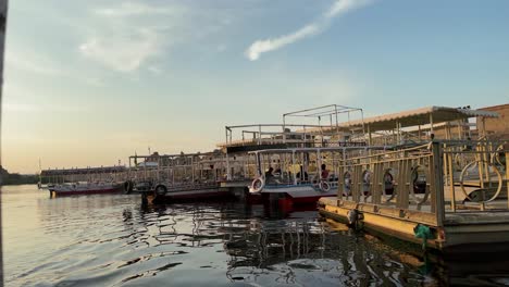 Beautiful-Love-Philae-temple-at-sunset-light-the-beautiful-temple-of-Philae-and-the-Greco-Roman-buildings-are-seen-from-the-Nile-river-a-temple-dedicated-to-Isis,-goddess-of-love-Aswan-Egypt