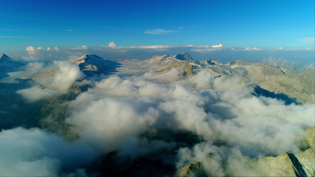 Aerial view over the alpine mountain chain