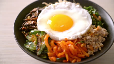 bibimbap, korean spicy salad with rice bowl - traditionally korean food style