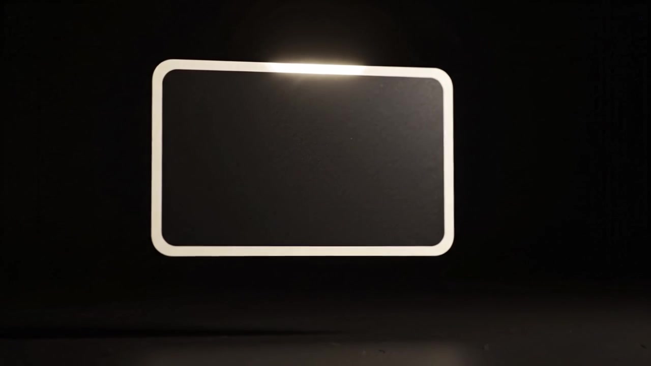 Floating Frame in Dark Background: A Minimalistic Display of a Rectangular White-Lined Frame Against a Black Backdrop for Modern Aesthetic Impressions