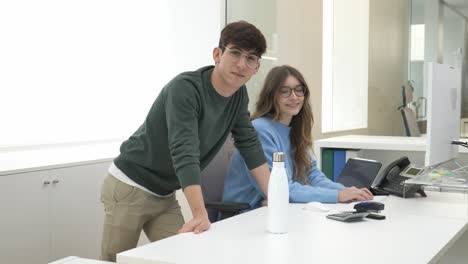 young professionals posing in modern office