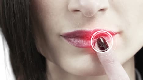 close up view of a woman touching her lips