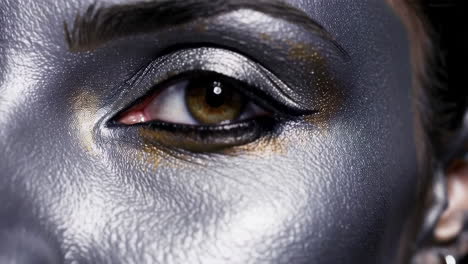 close-up of a woman with creative face paint and eye makeup