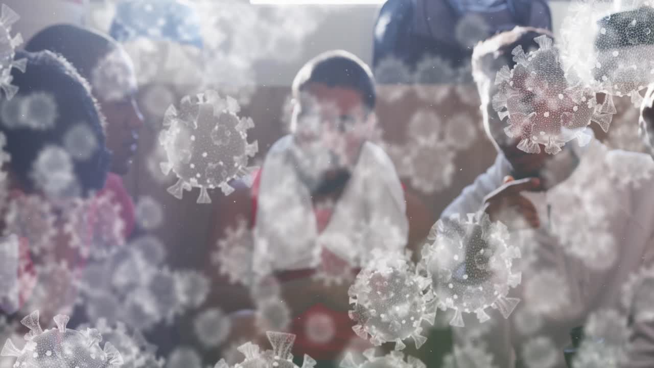 변기실에서 남성 축구 선수들의 다양한 그룹 위에 떠다니는 바이러스 세포의 애니메이션