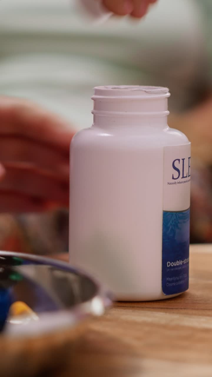 Vertical Video Professional nurse separating pills and medicine in two different bottles