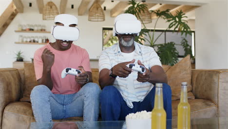 playing video games with vr headsets, father and adult son enjoying time together
