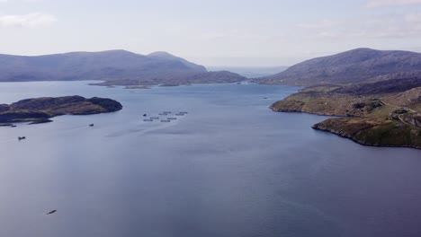 wide drone shot of the bay around tarbert, a village on the isle of harris, part of the outer hebrides of scotland