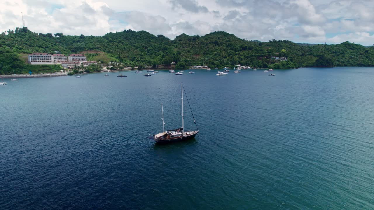Aerial Orbit of Anchored Recreational Sailing Boat on Samana Bay, Dominican