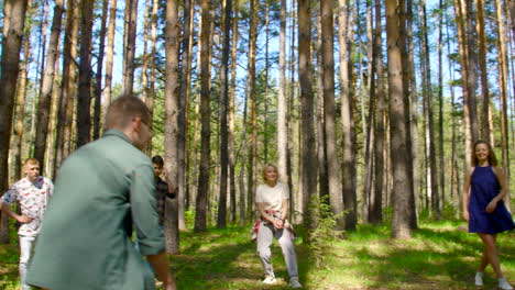 friends playing in the forest