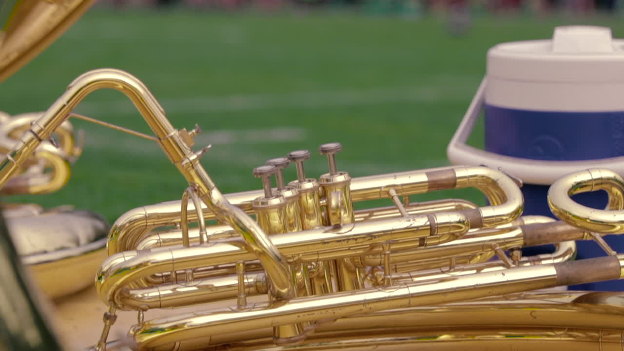 Cinematic high school marching band warming up in slow motion
