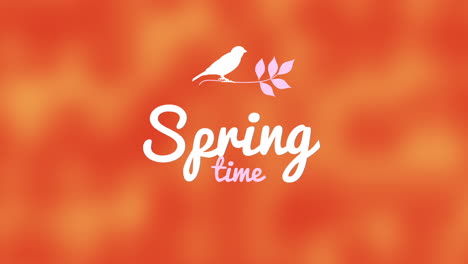 spring time text with bird on branch with blurred orange and white background